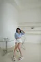 ✈俏皮桃樂絲-韓國標籤格紋澎袖短版上衣(有墊肩)