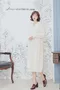鉤織麻花 鬆軟長版針織外套_(杏)