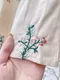 綠粉枝葉刺繡 開釦小裙擺上衣