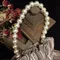BB05復古名媛絲綢緞珍珠手提包