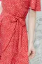 荷葉裙擺Ｖ領短洋裝_附腰帶(S~XL)(2色:紅底白點)