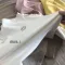 男女笑臉高領上衣